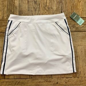 Brand new white Inphorm tennis skirt with pockets. Navy stripes down each side.